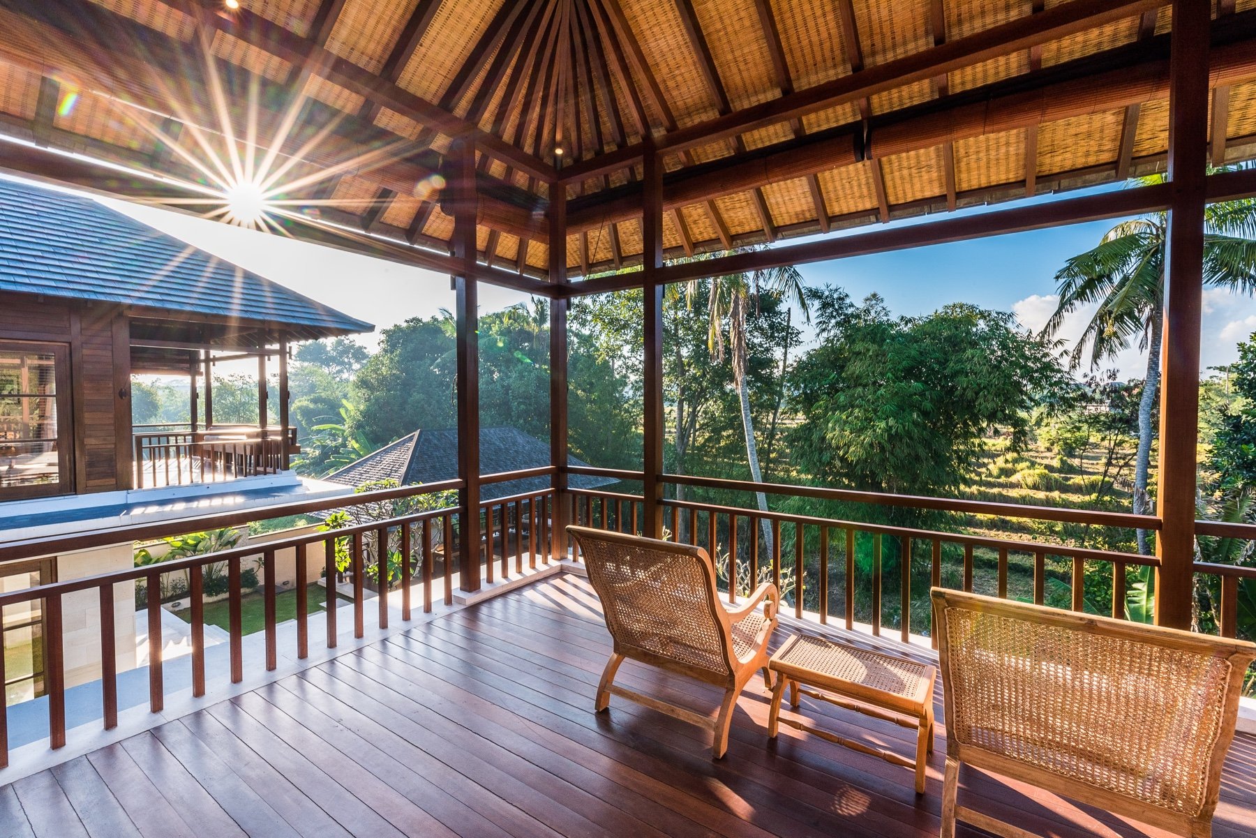 Sunrise on rattan chairs on the balcony