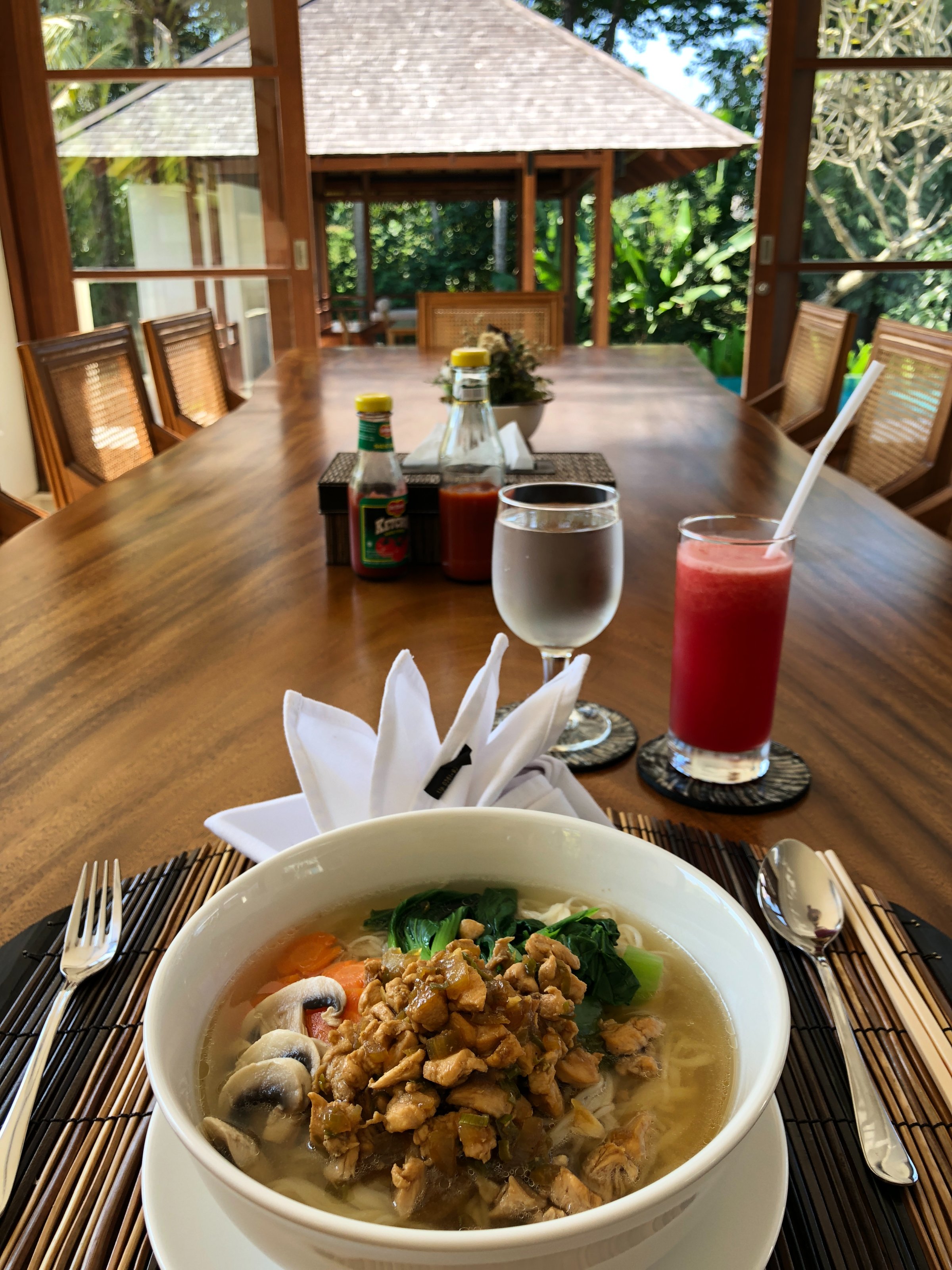 Bowl of noodles with view through to bale outside