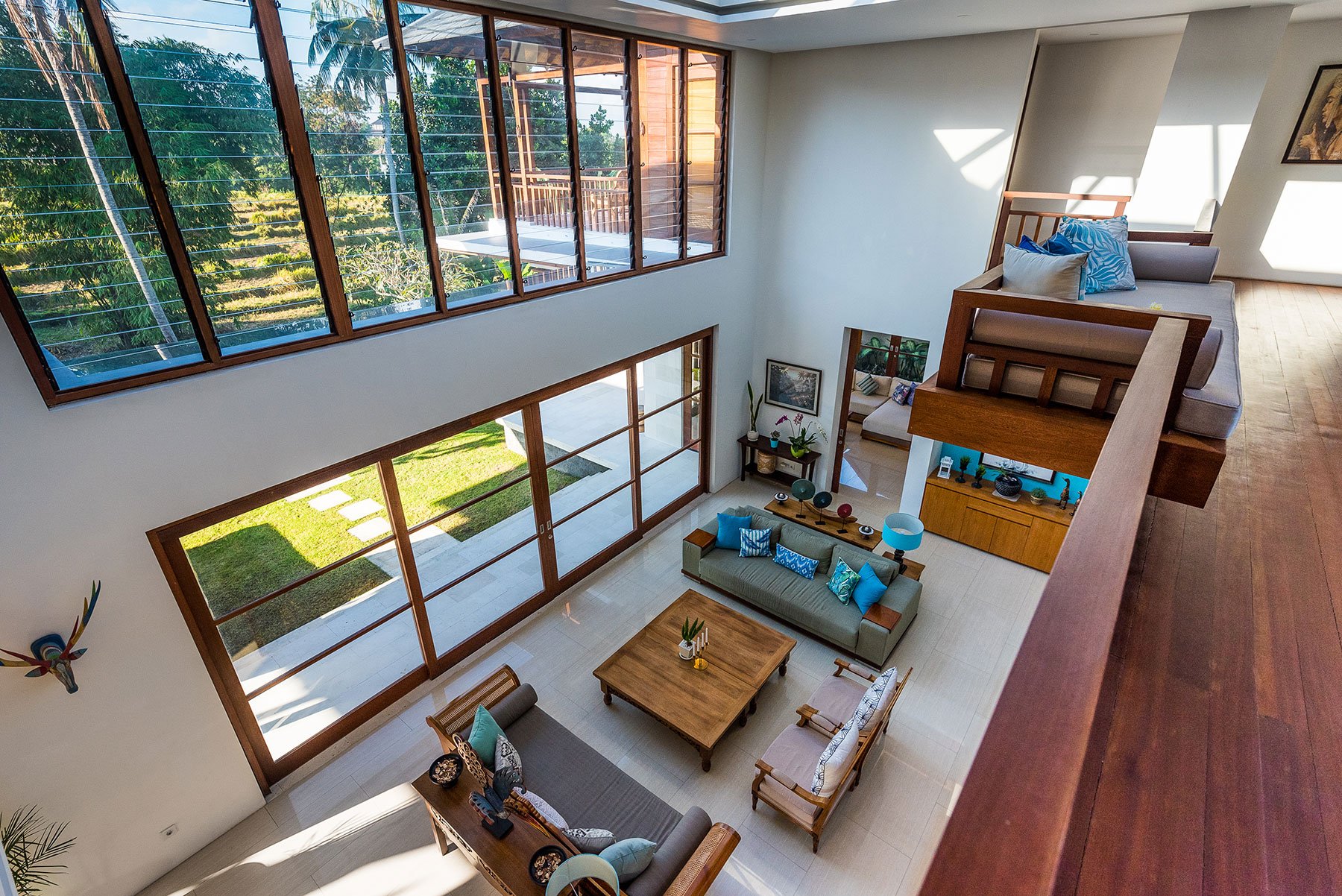 Top-down view of living from upper balcony