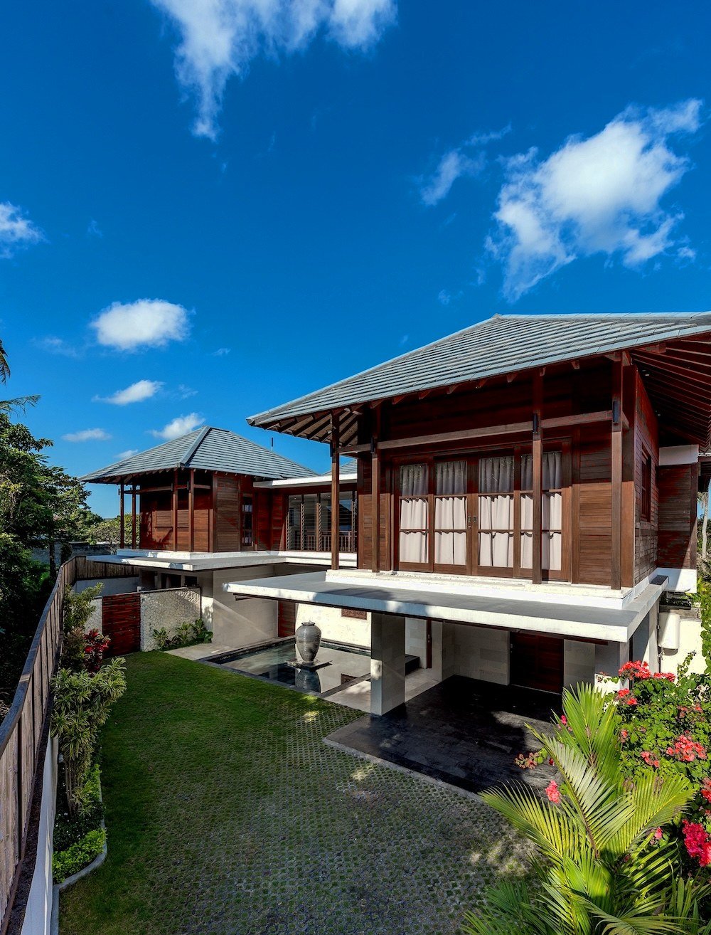Villa exterior from above — entry, garden and carport
